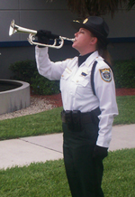 Honor guard playing trumpet